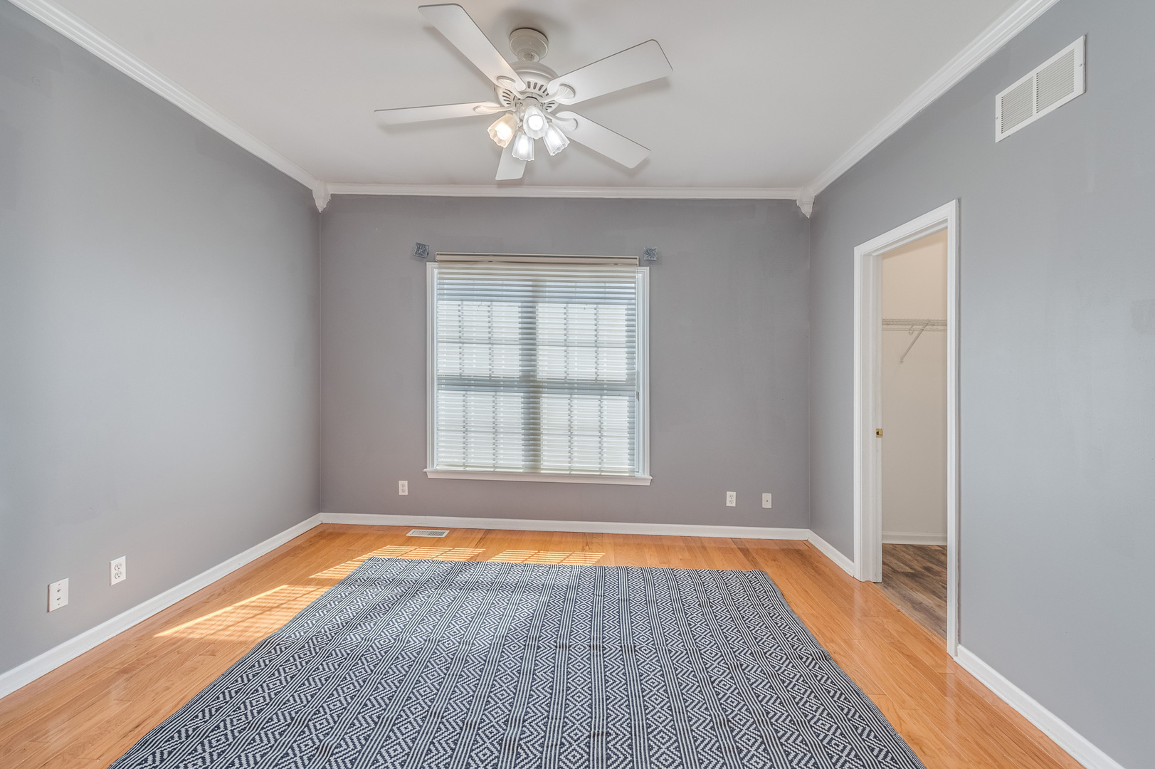 243 Boxcar Avenue Naperville, IL 60540 - Photo 22 of 29 wooden floor in an empty room with a window