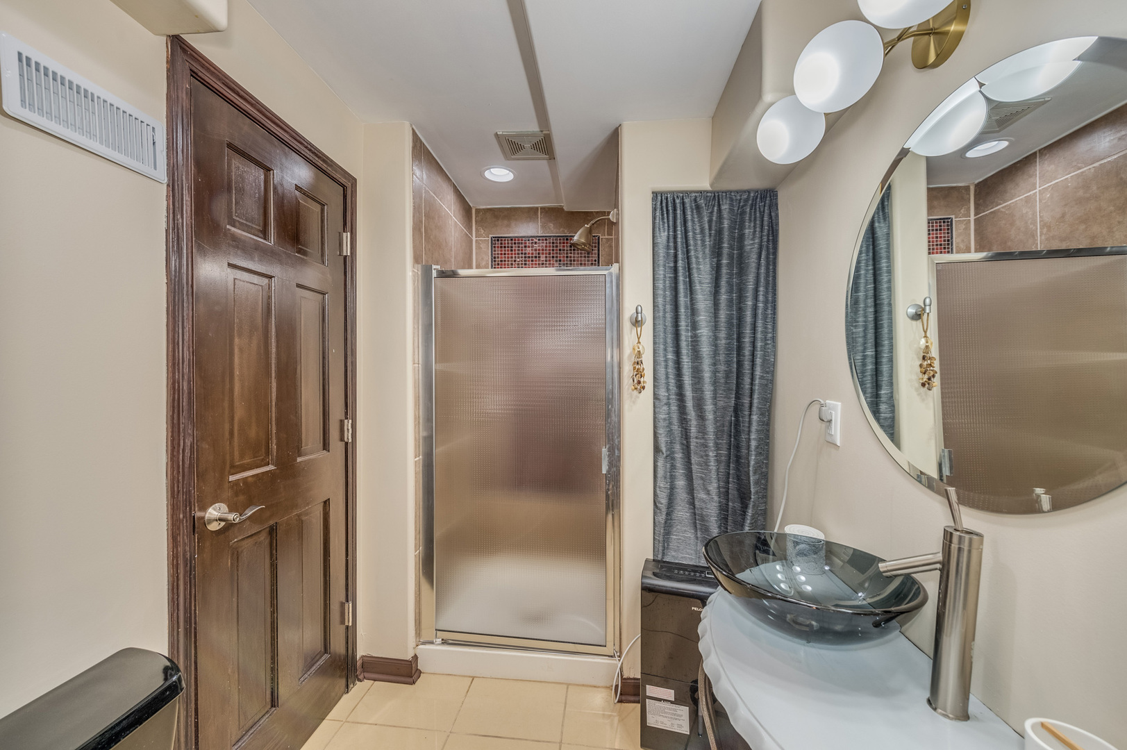 243 Boxcar Avenue Naperville, IL 60540 - Photo 26 of 29 a bathroom with a mirror and a shower