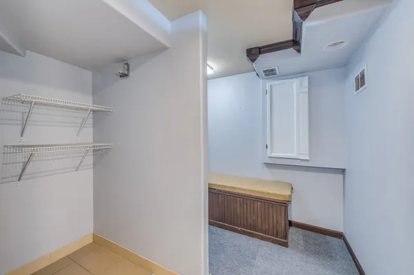 a view of room with cabinets
