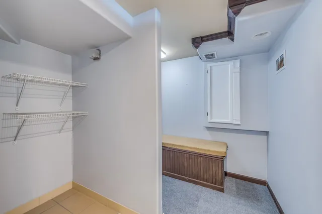 a view of room with cabinets