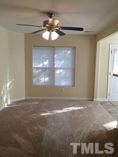 3702 Wyndcliff Court Raleigh, NC 27616 - Photo 7 of 10 a view of an empty room with a window