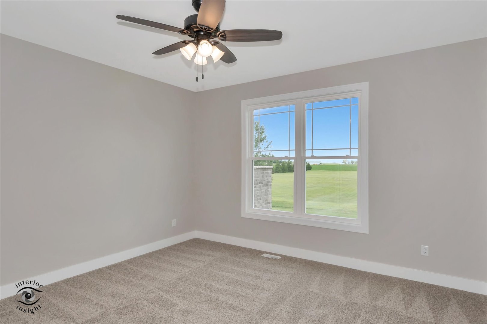 362 White Hawk Way Manteno, IL 60950 - Photo 12 of 27 an empty room with a window and a fan