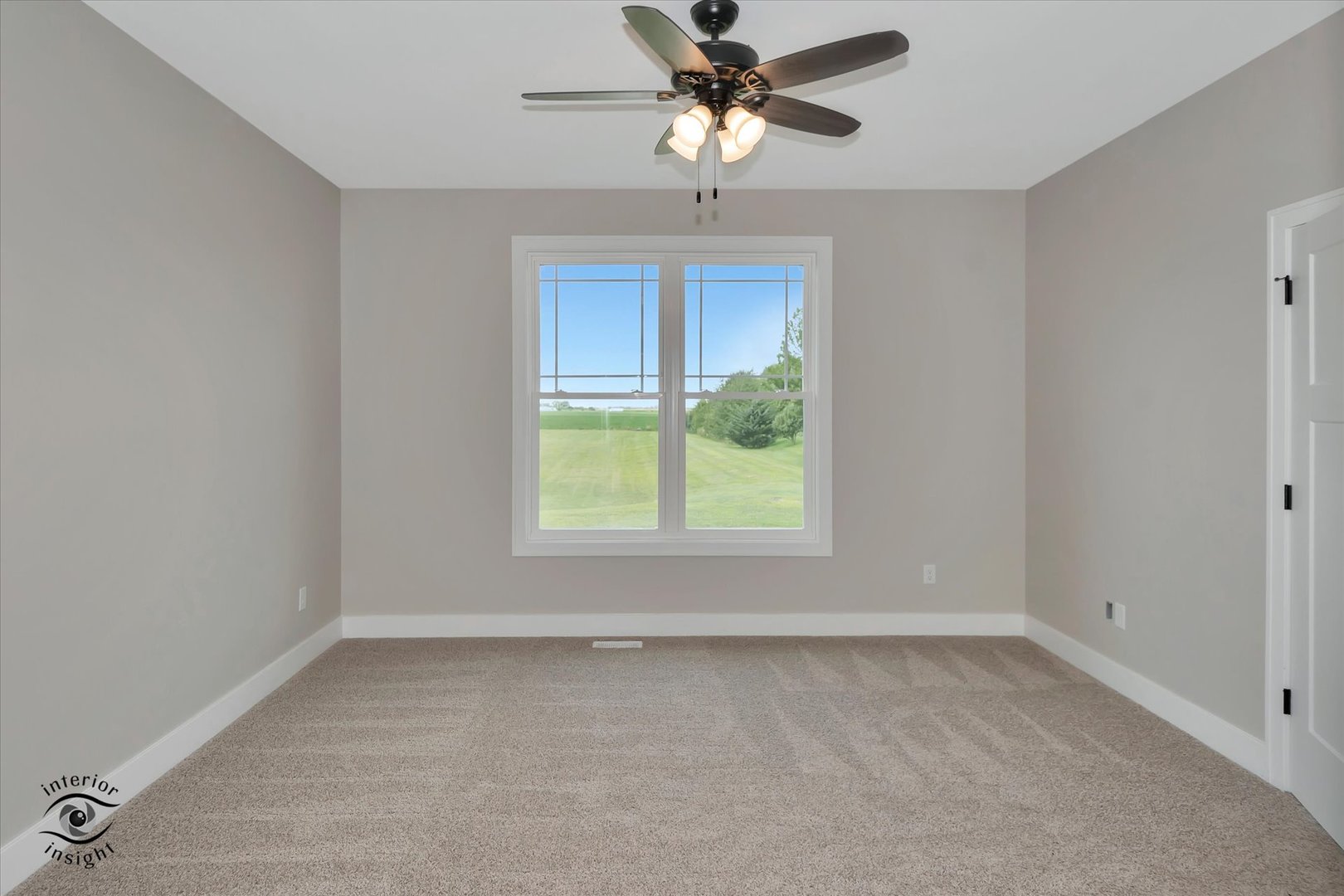 362 White Hawk Way Manteno, IL 60950 - Photo 13 of 27 an empty room with a window and a fan
