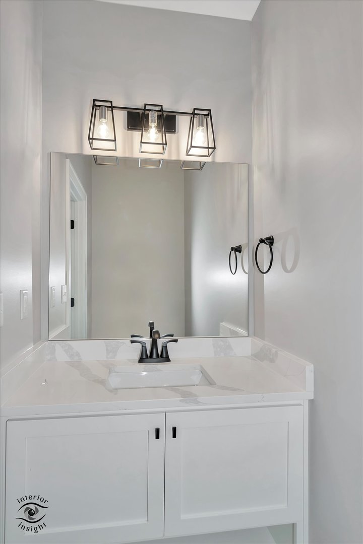 362 White Hawk Way Manteno, IL 60950 - Photo 22 of 27 a bathroom with a sink and a mirror