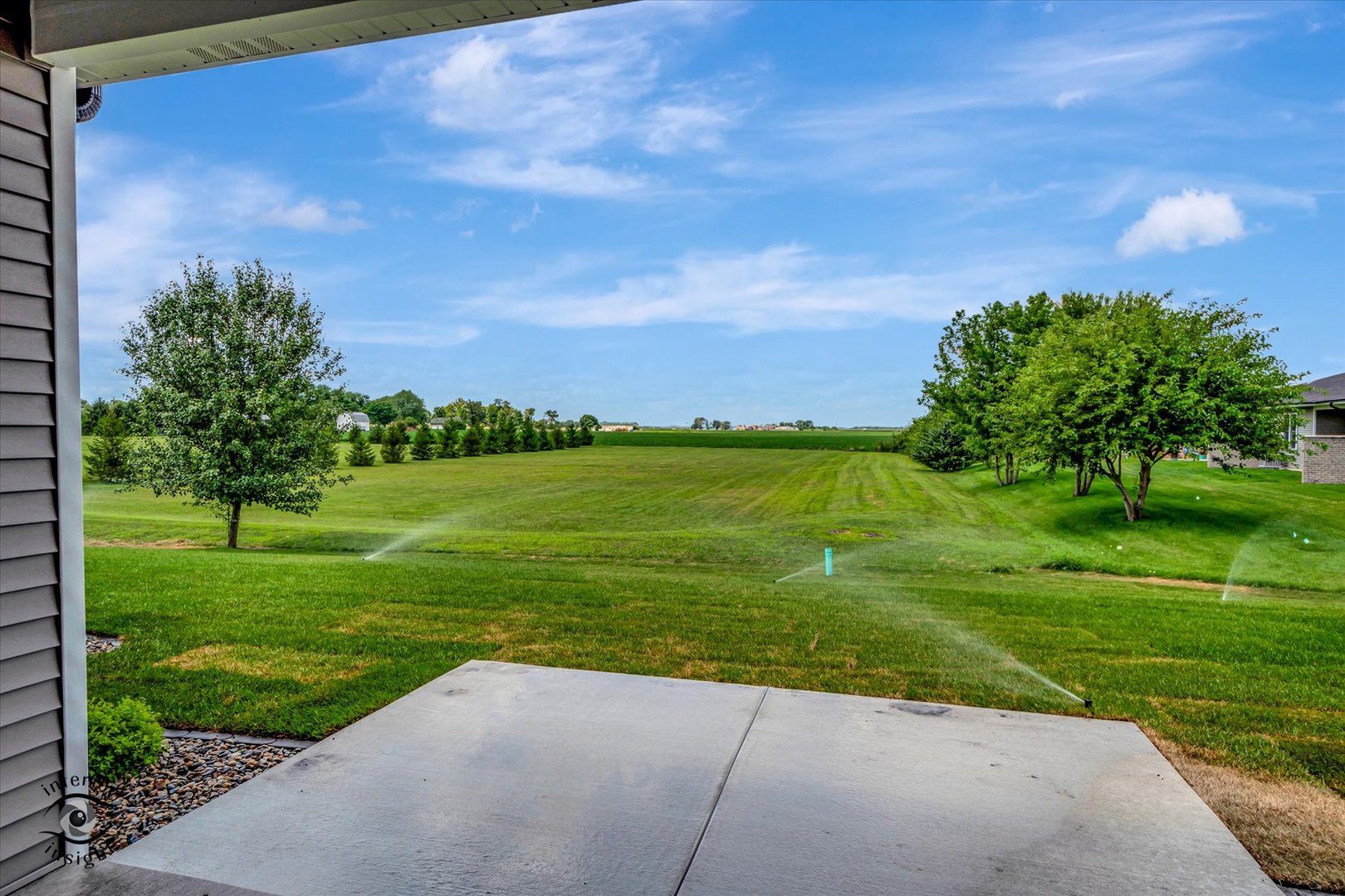 362 White Hawk Way Manteno, IL 60950 - Photo 26 of 27 a view of a green yard with a house in the background