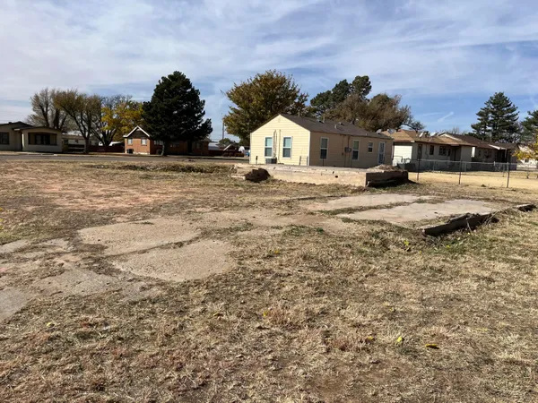 a view of road and house