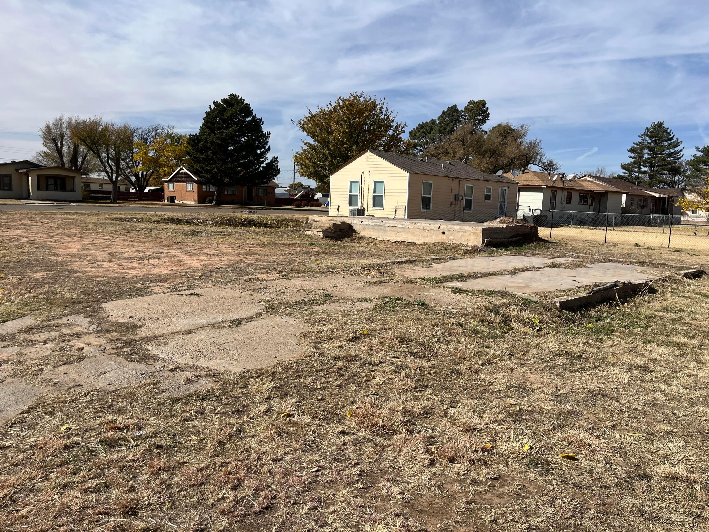 a view of road and house