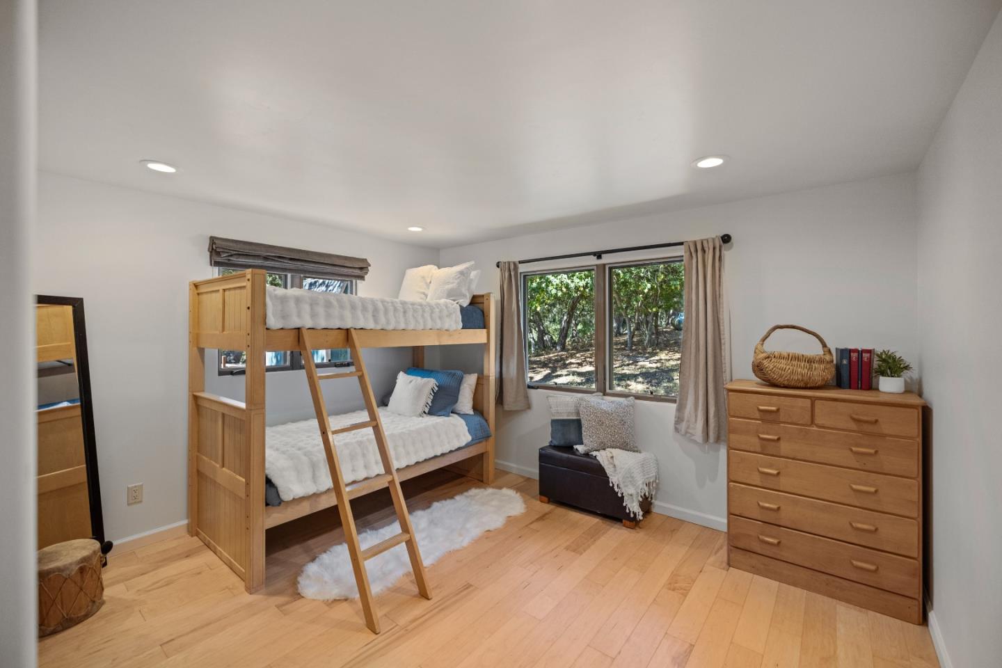 11660 McCarthy Road Carmel Valley, CA 93924 - Photo 12 of 21 a bedroom with furniture and a window