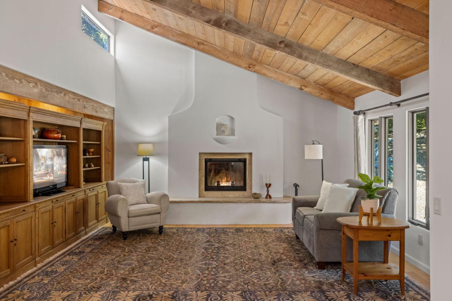 11660 McCarthy Road Carmel Valley, CA 93924 - Photo 3 of 21 a living room with furniture and a flat screen tv