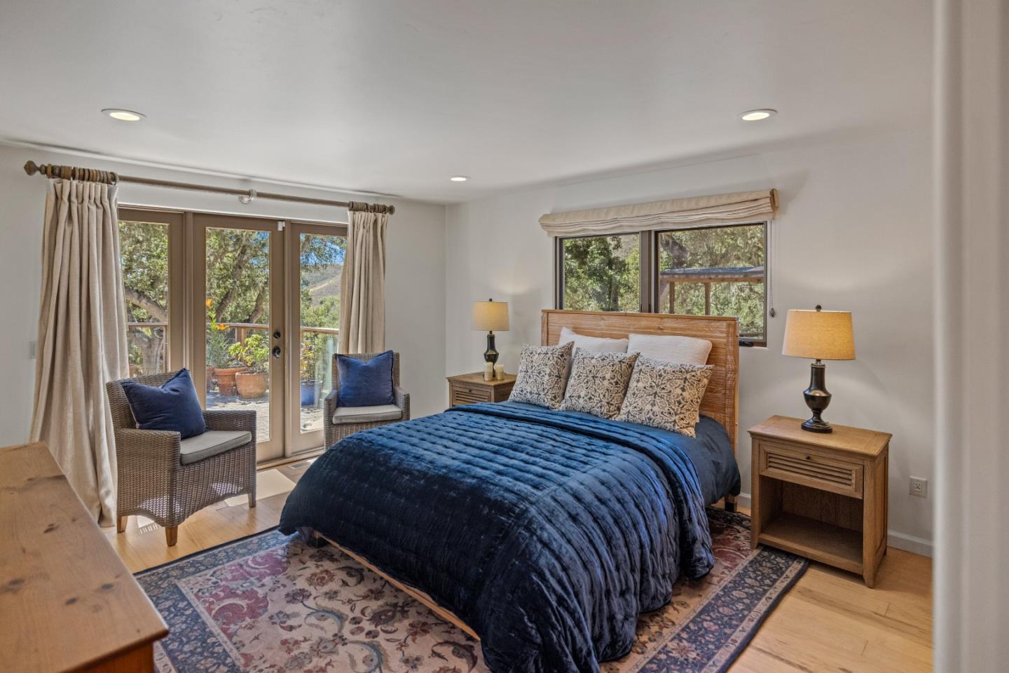 11660 McCarthy Road Carmel Valley, CA 93924 - Photo 9 of 21 a bed room with a bed and a couch