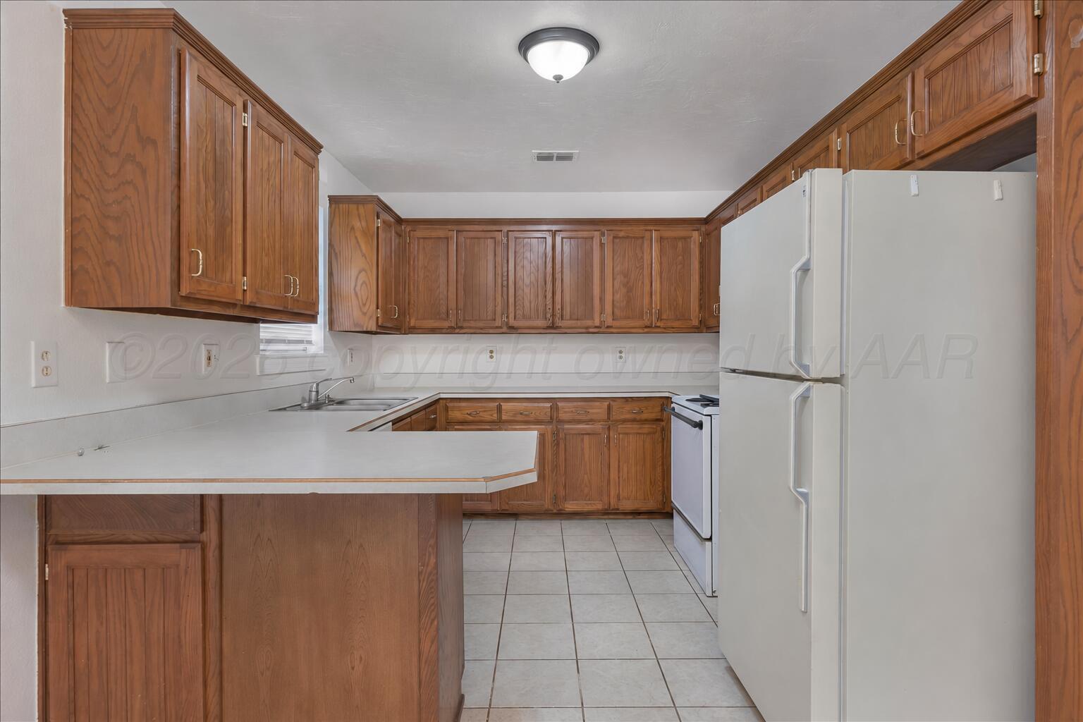 4415 South Hayden Street Amarillo, TX 79110 - Photo 9 of 21 09-Kitchen jpg