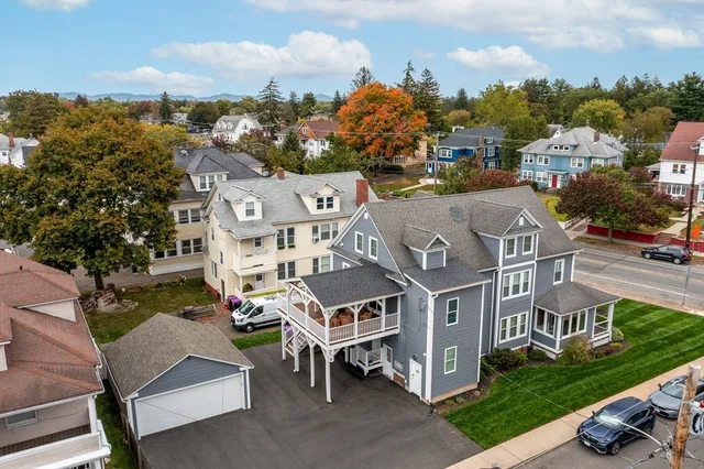 a kitchen that has a lot of cabinets in it and appliances