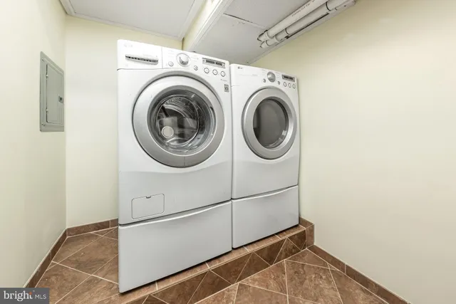 a utility room with dryer and washer
