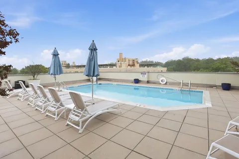 a view of roof deck with seating space