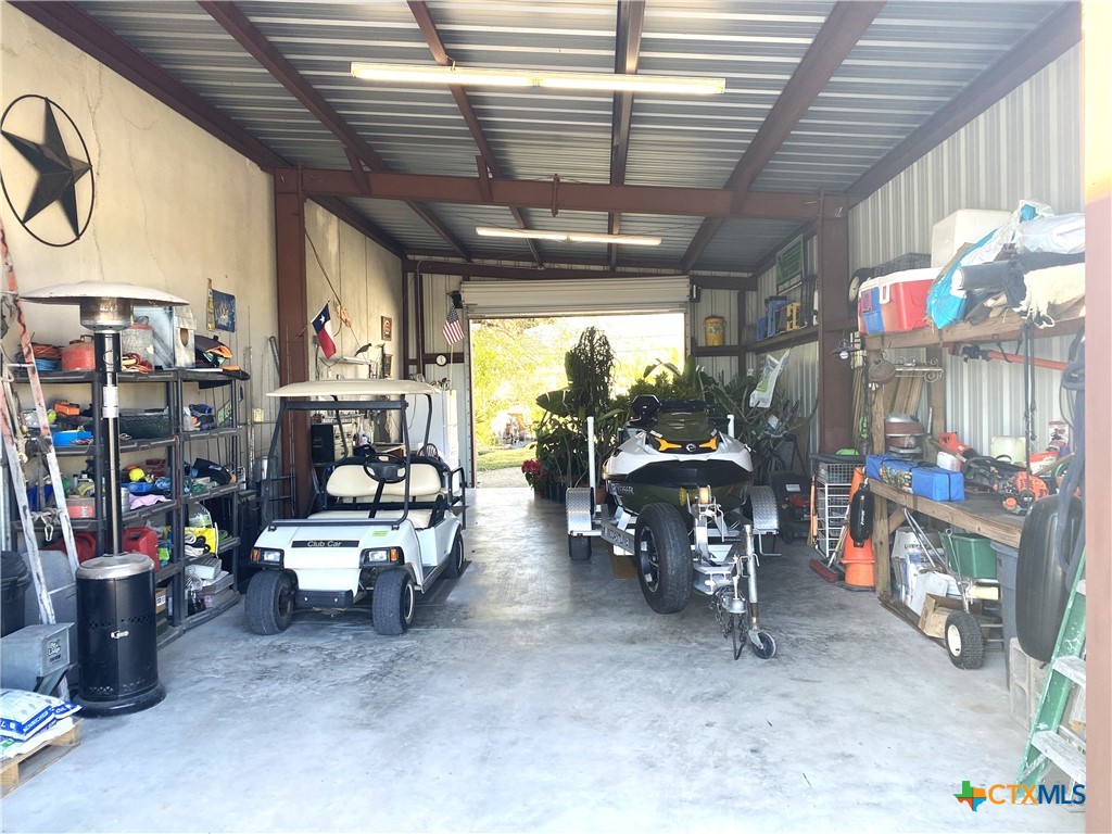 316 South Main Street Seadrift, TX 77983 - Photo 12 of 12 a living room with lots of furniture and a chandelier
