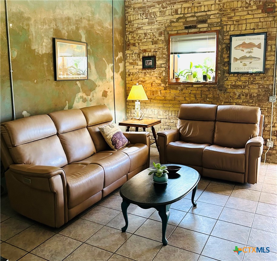 316 South Main Street Seadrift, TX 77983 - Photo 5 of 12 a living room with furniture and a couch