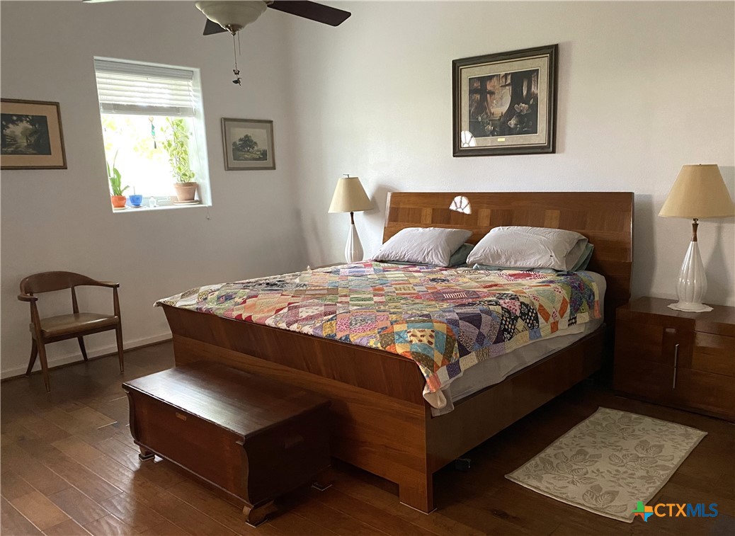 316 South Main Street Seadrift, TX 77983 - Photo 6 of 12 a bedroom with bed and window