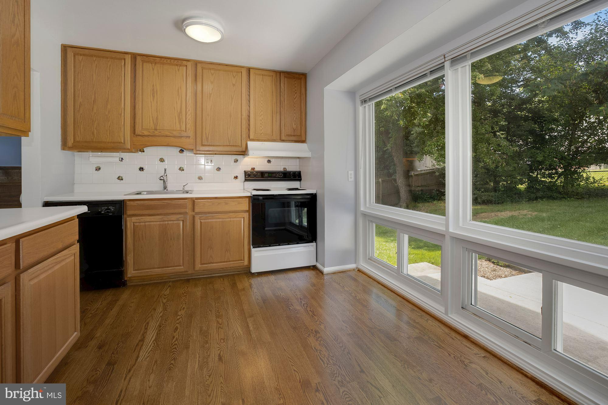 4105 Weller Road Silver Spring, MD 20906 - Photo 9 of 29 KITCHEN W/ VIEW TO BACKYARD