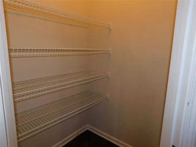 a view of small space with racks on the wall