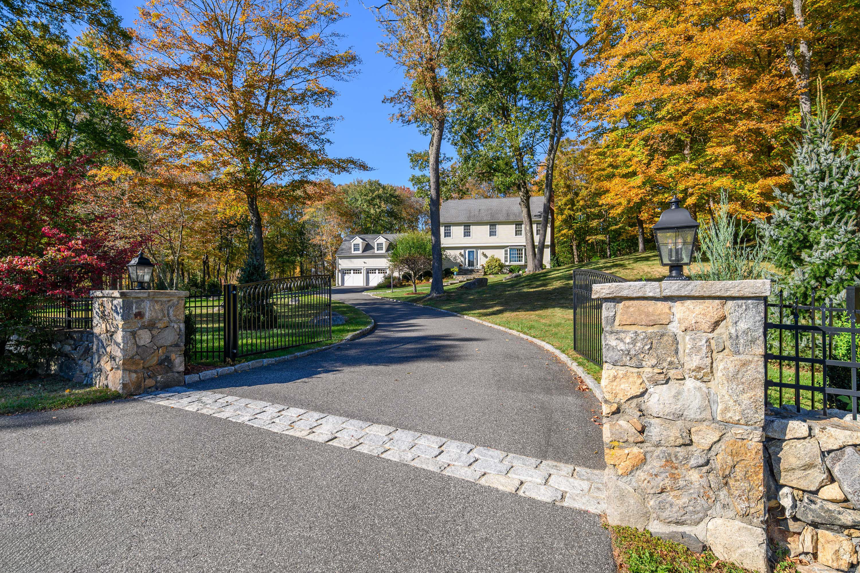 a view of a street with houses on both side