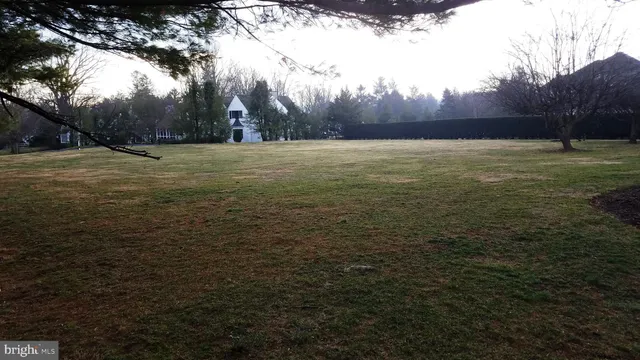 a view of patio and yard