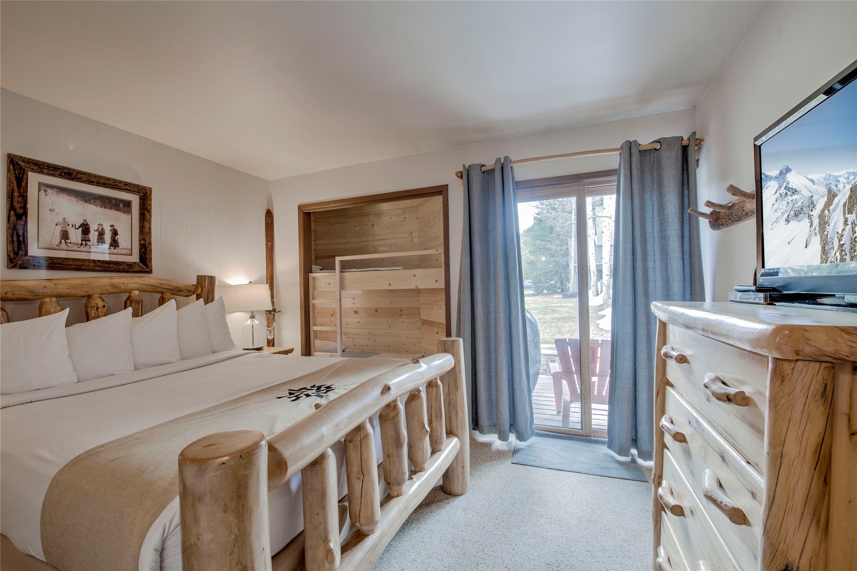 1977 Soda Ridge Road, Unit 1210 Keystone, CO 80435 - Photo 13 of 31 Access to the walk out patio from the bedroom