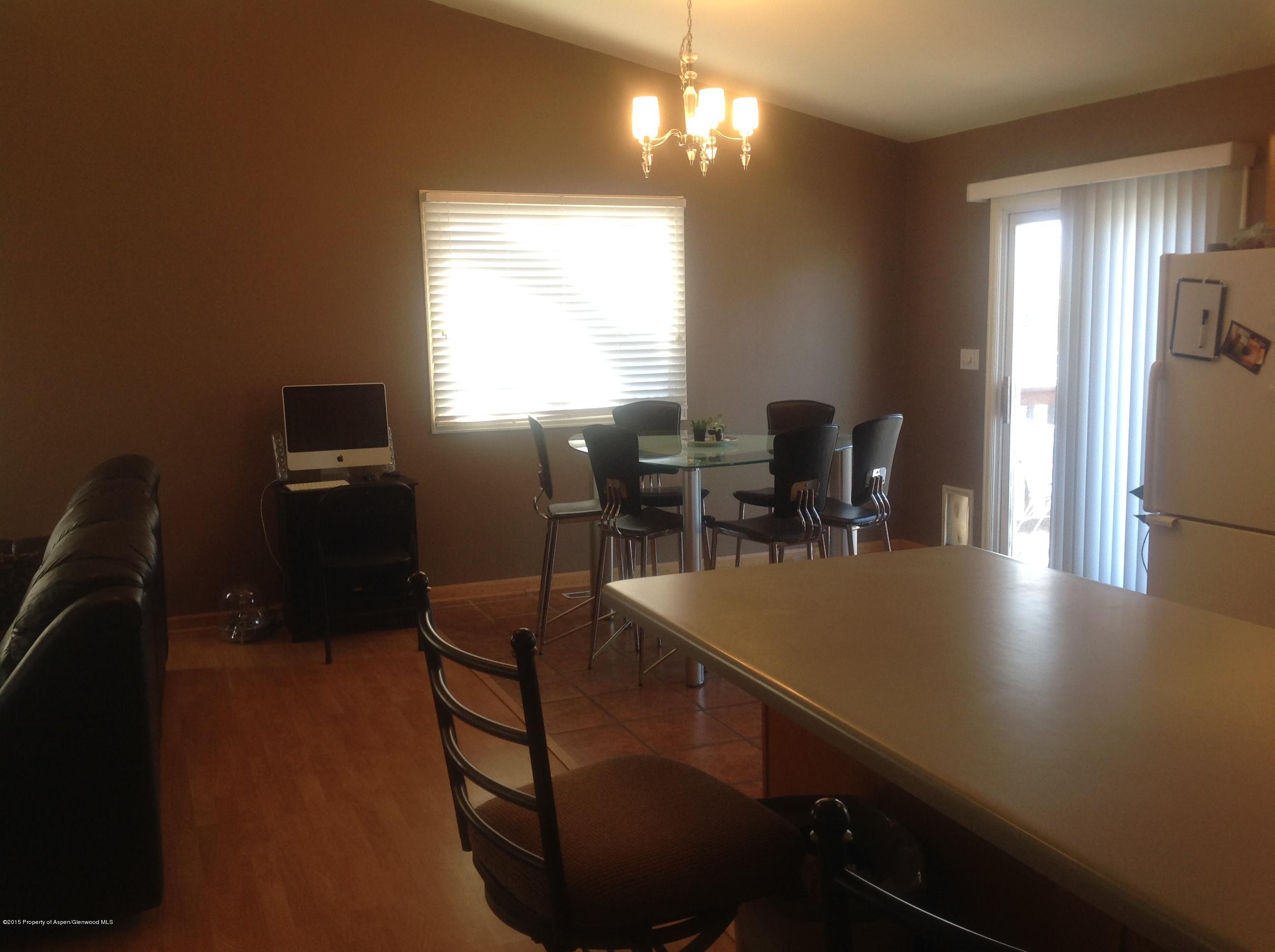801 Whiteriver Avenue Rifle, CO 81650 - Photo 5 of 10 a view of a dining room with furniture