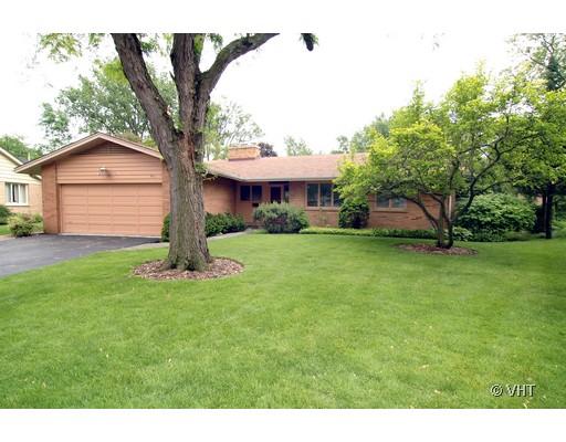 803 Redbud Lane Wilmette, IL 60091 - Photo 1 of 1 a front view of a house with a yard and garage