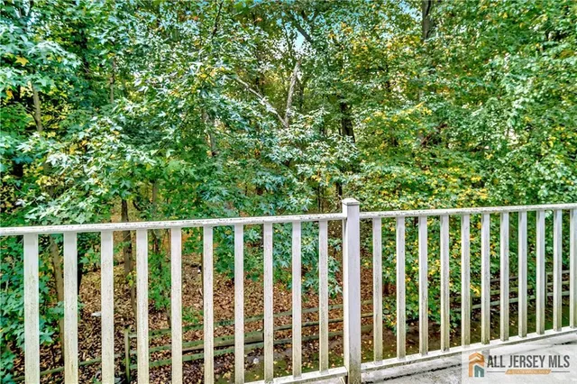 a view of a wooden fence and floor