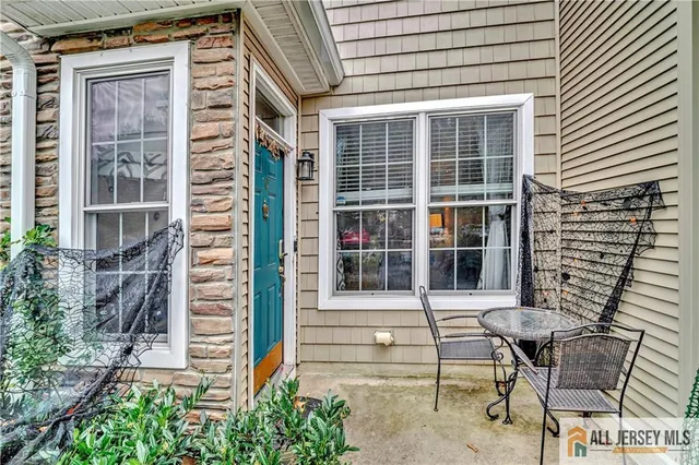 a front view of a house with a porch