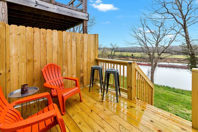 a view of swimming pool with seating area