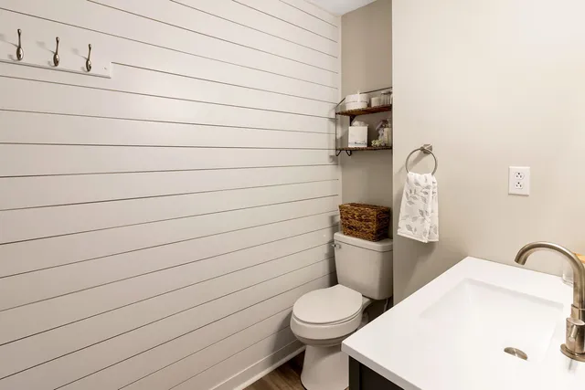 a bathroom with a toilet and a sink