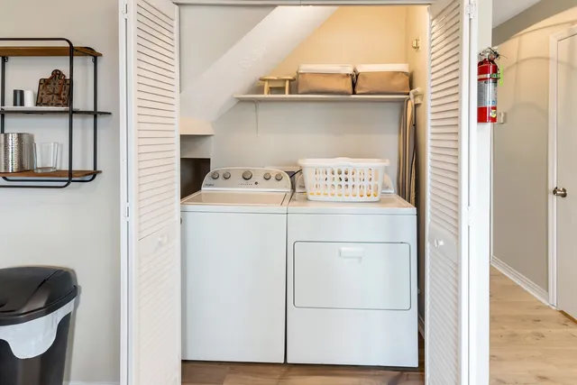 a utility room with dryer and washer