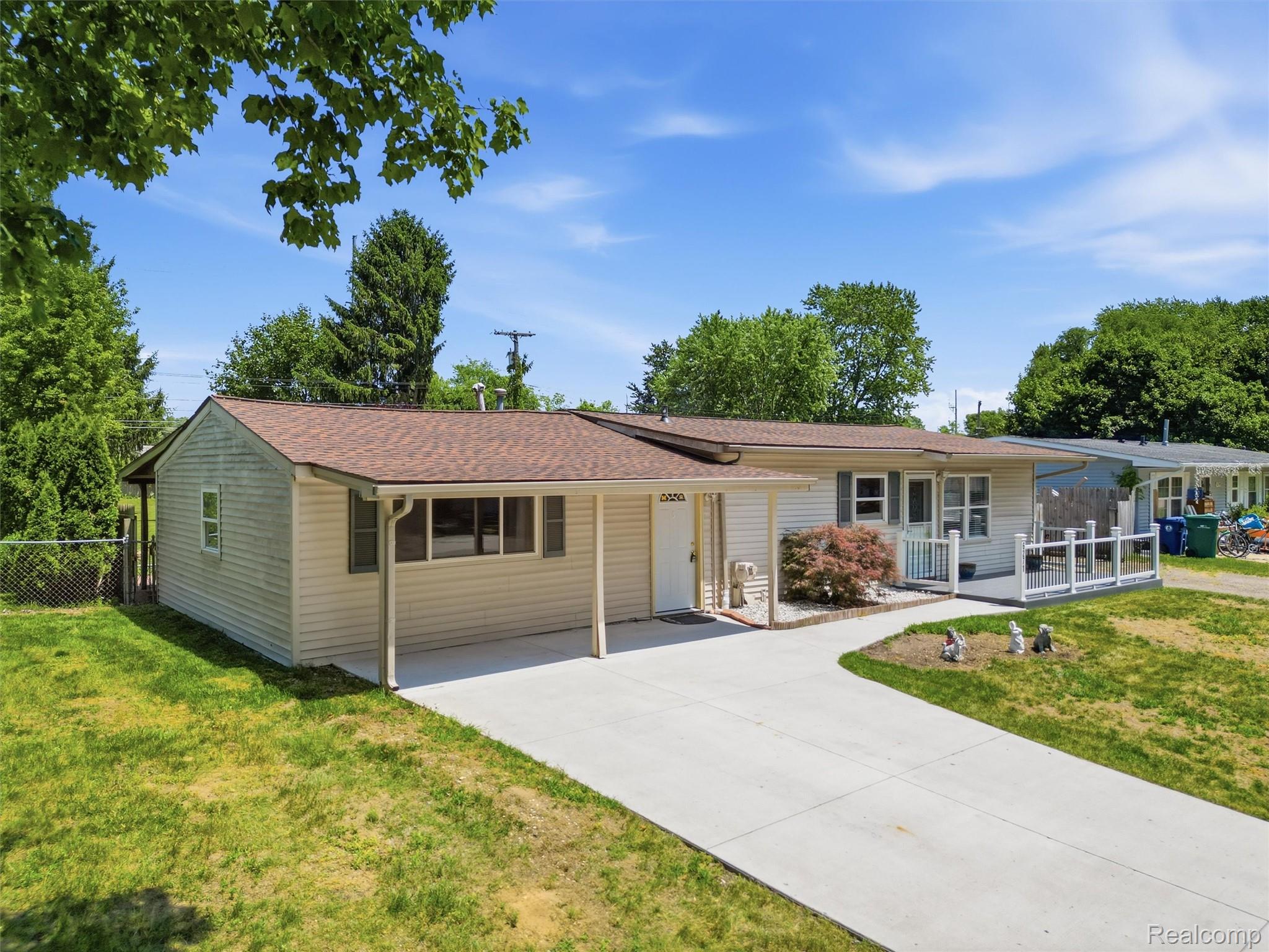 6271 Stephen Brighton, MI 48116 - Photo 2 of 28 New concrete driveway and walkway