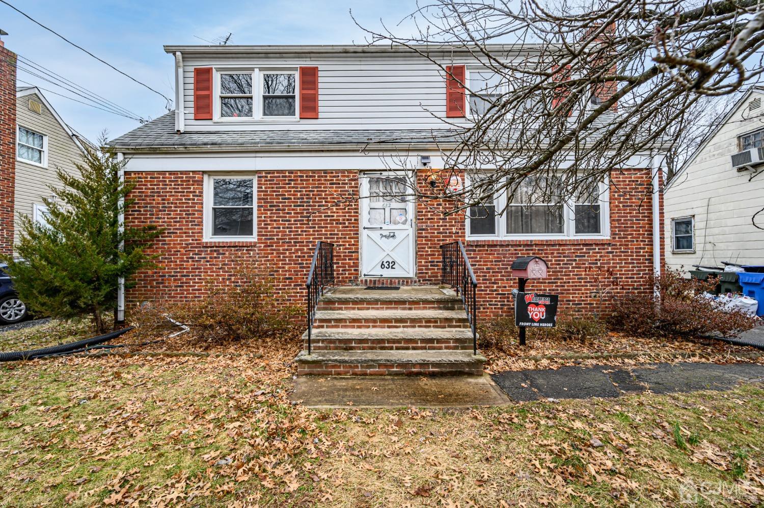 632 West Avenue Sewaren, NJ 07077 - Photo 1 of 30 a front view of a house with a yard