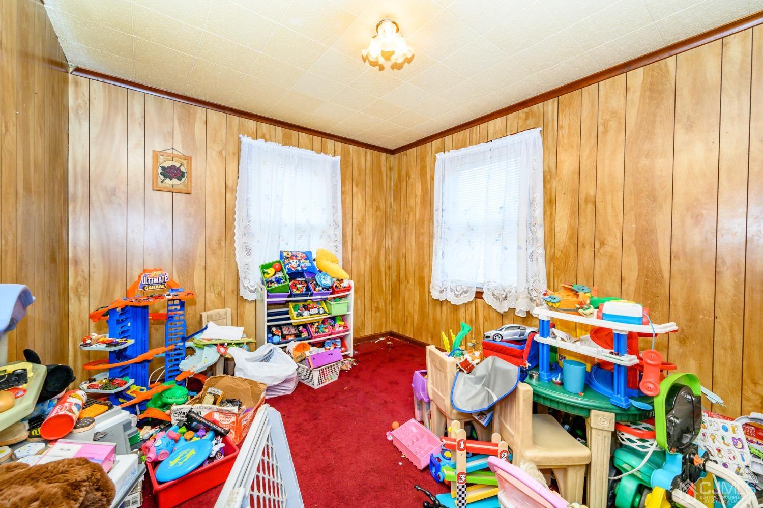 632 West Avenue Sewaren, NJ 07077 - Photo 14 of 30 a room with toys and a dining table