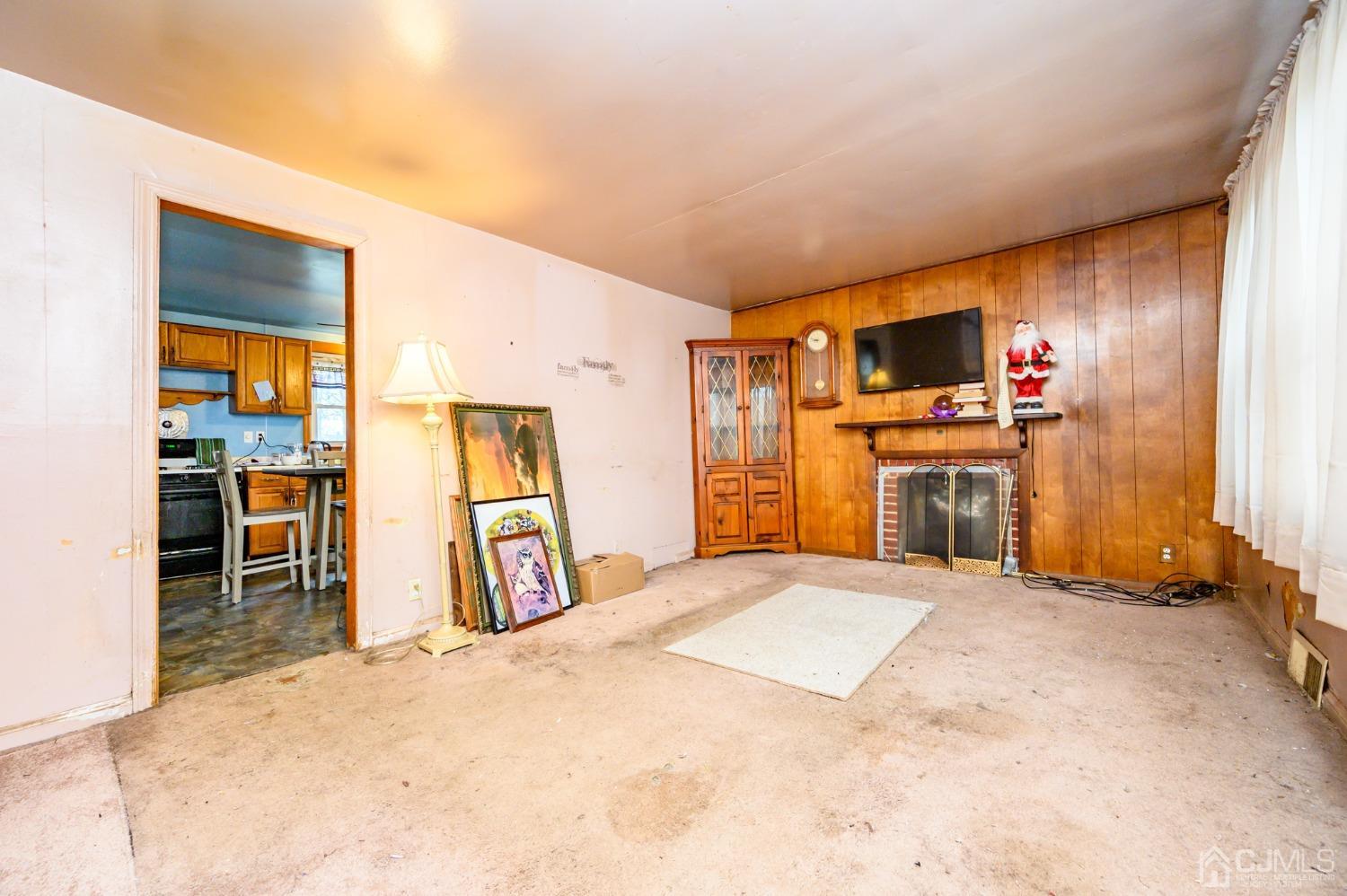 632 West Avenue Sewaren, NJ 07077 - Photo 3 of 30 a view of a livingroom with furniture and a kitchen