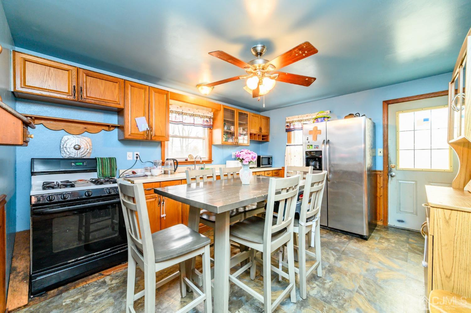 632 West Avenue Sewaren, NJ 07077 - Photo 6 of 30 a view of a dining room with furniture window and outside view