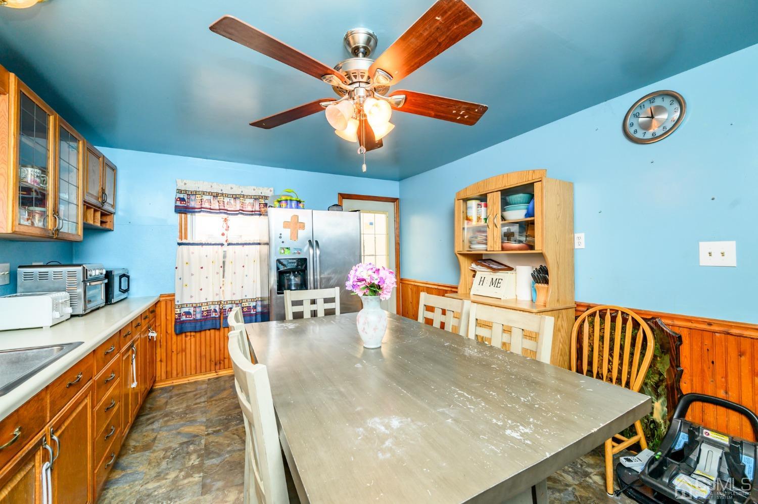 632 West Avenue Sewaren, NJ 07077 - Photo 9 of 30 a dining room with furniture and a large window