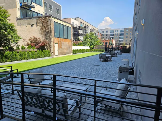 a view of a terrace with sitting area