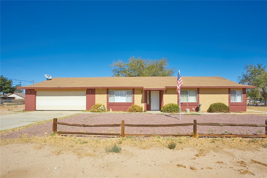 14946 Olivera Road Victorville, CA 92392 - Photo 1 of 1 a front view of a house with a yard