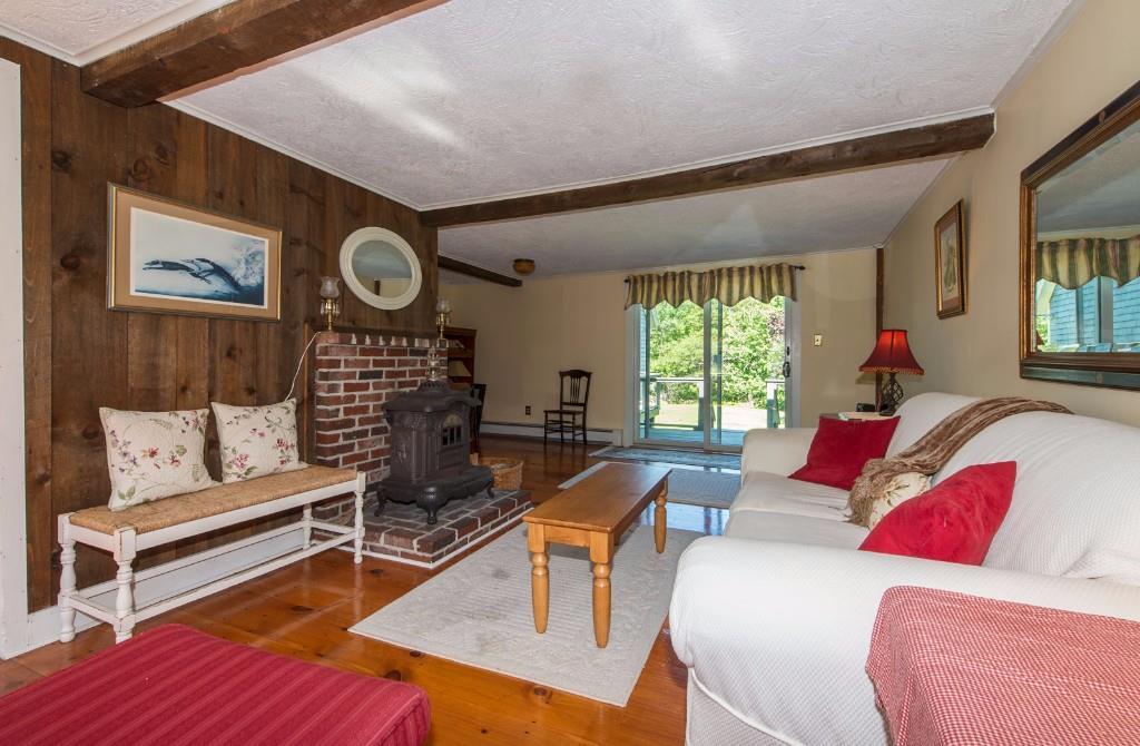 581 Ocean Point Road Boothbay, ME 04544 - Photo 20 of 25 Parlor with deck access.