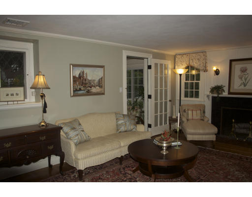 65 Hagen Road Newton, MA 02459 - Photo 11 of 17 a living room with furniture and a fireplace