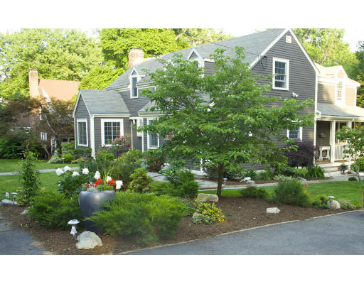65 Hagen Road Newton, MA 02459 - Photo 3 of 17 a view of a house with a yard