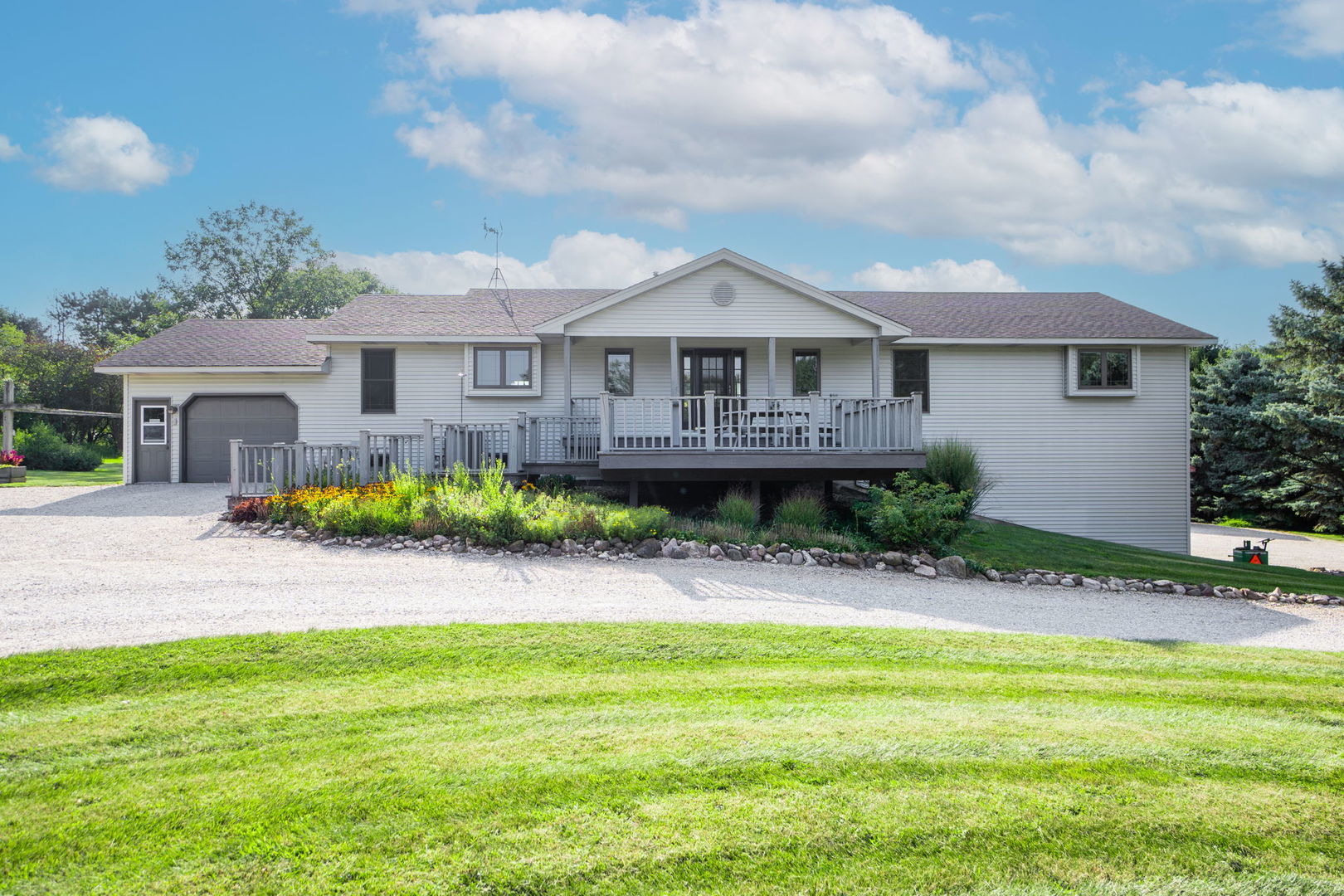 47 10n180 State Route Elgin, IL 60124 - Photo 1 of 1 a front view of a house with a garden and porch