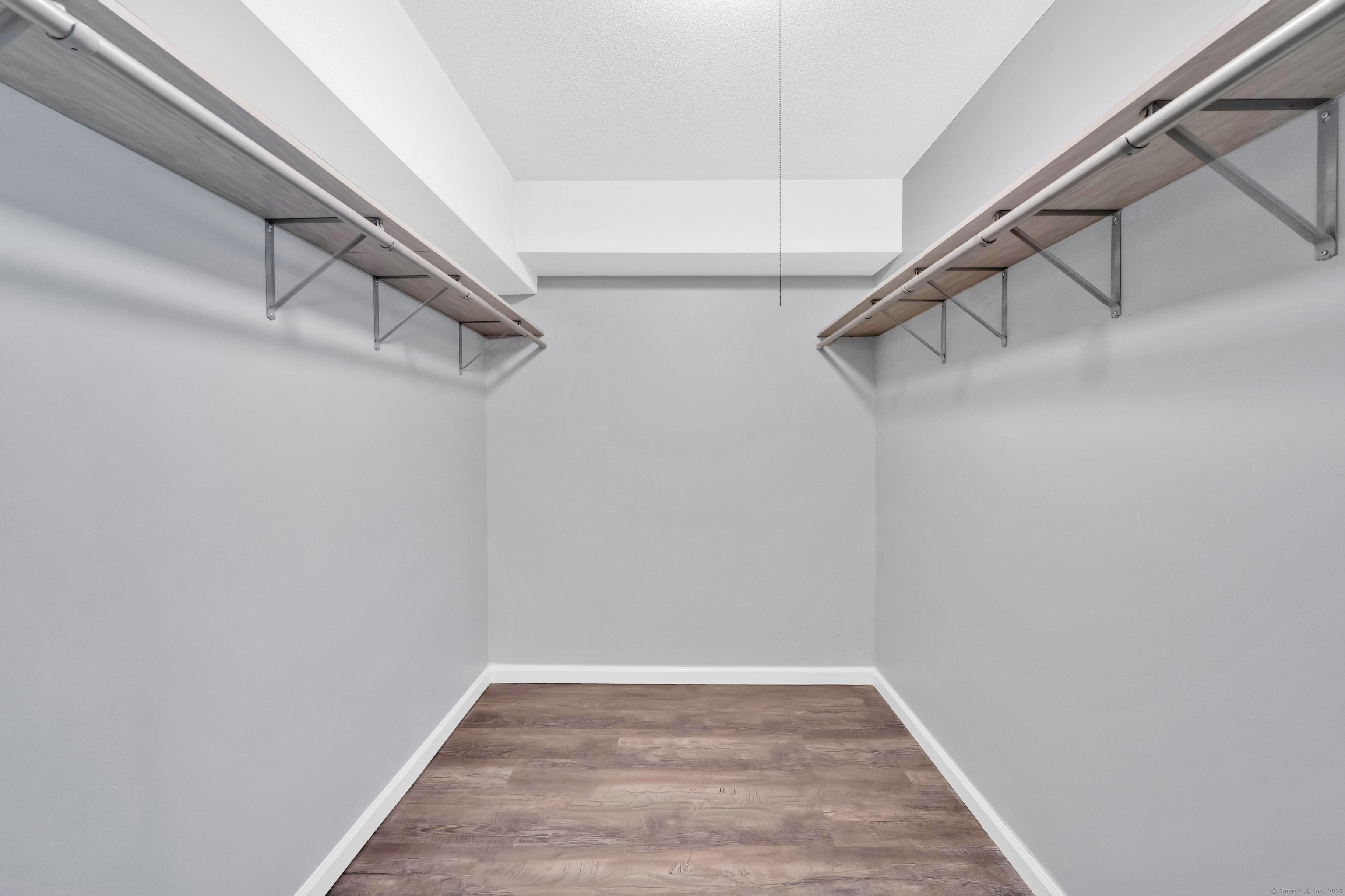 21 Pebblestone Circle, Unit 21 Suffield, CT 06078 - Photo 16 of 38 a view of a room with racks on the wall