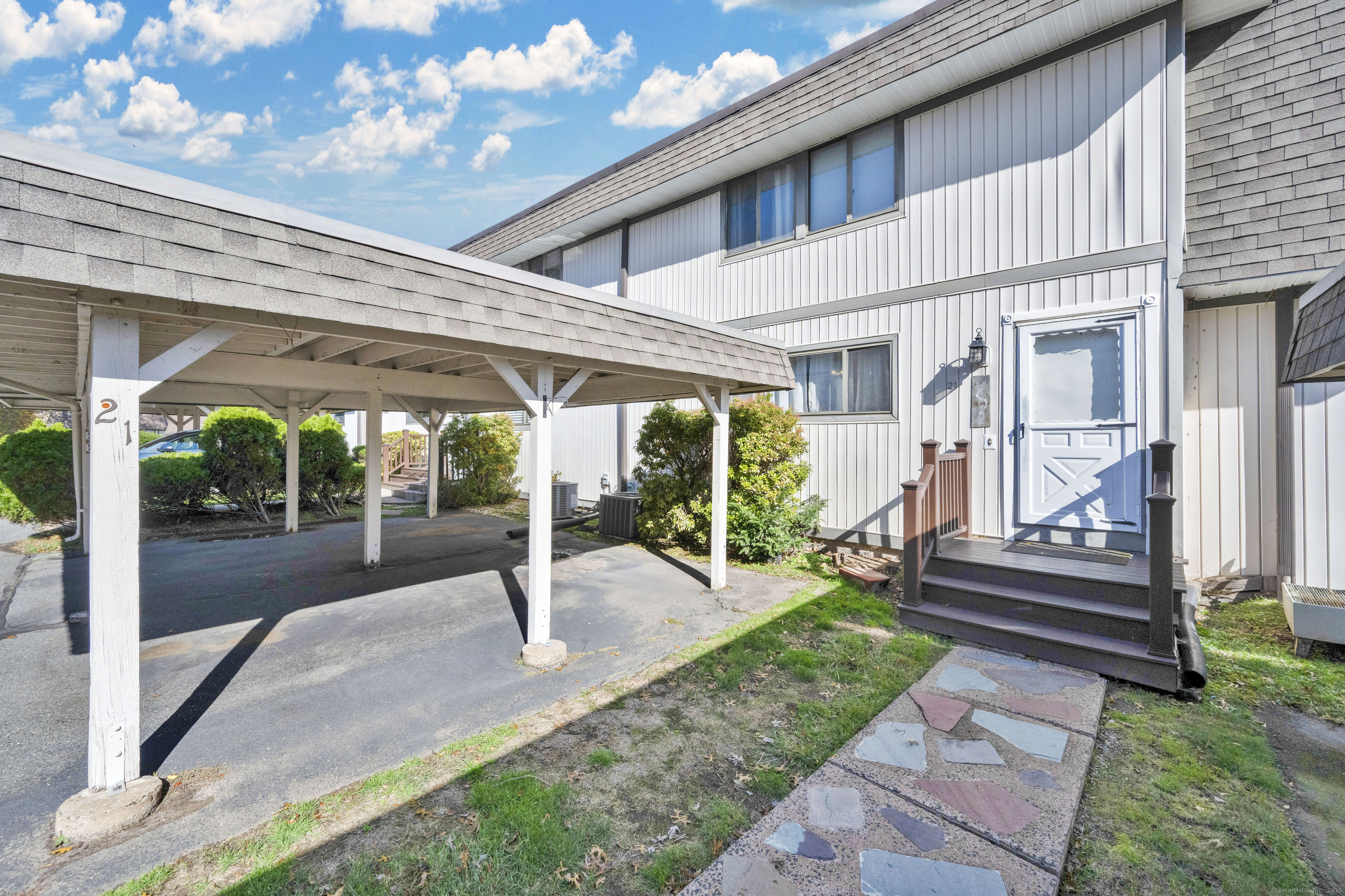21 Pebblestone Circle, Unit 21 Suffield, CT 06078 - Photo 2 of 38 a view of a house with backyard and porch