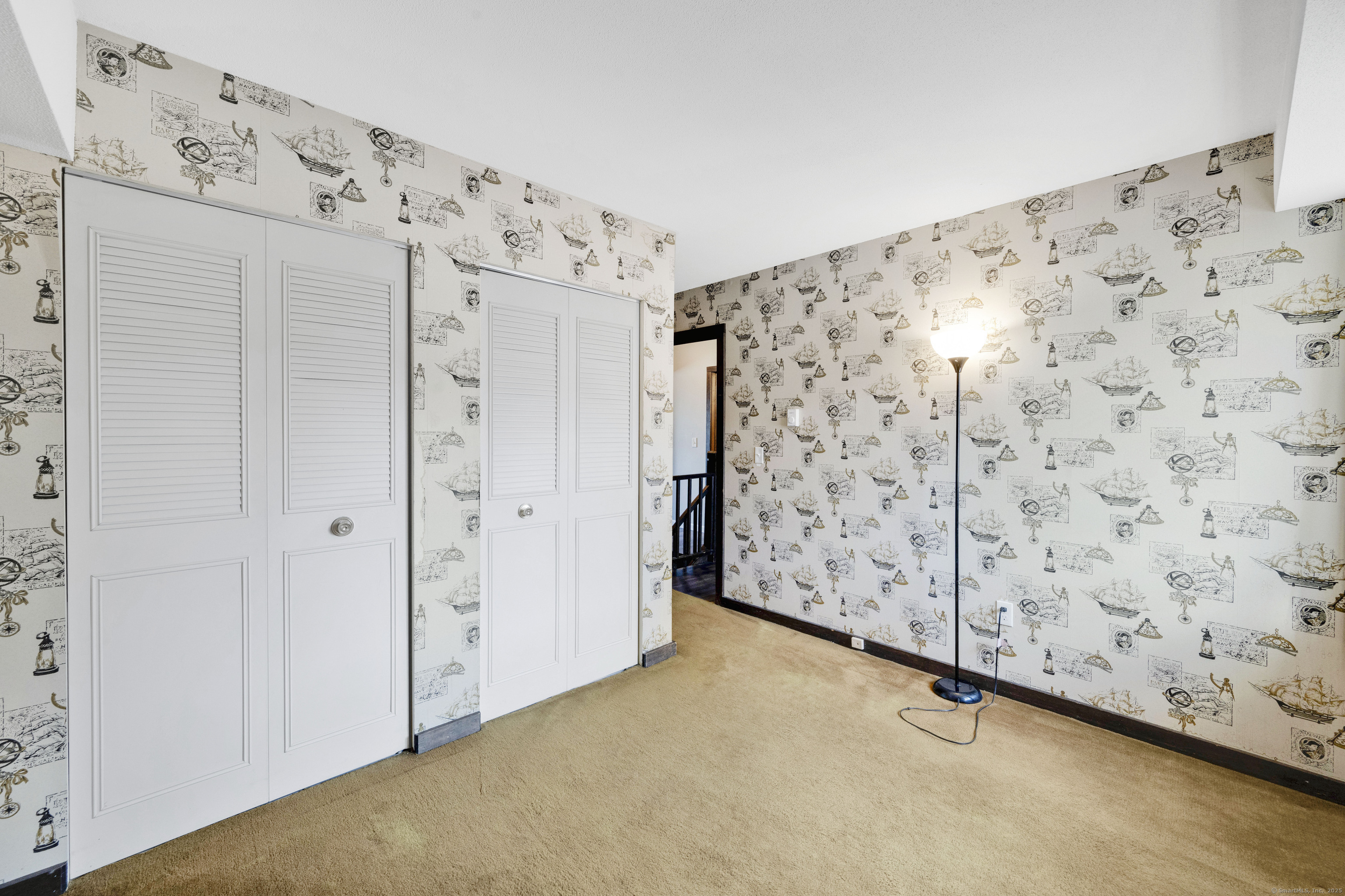 21 Pebblestone Circle, Unit 21 Suffield, CT 06078 - Photo 29 of 38 a view of a hallway with entryway in front of it