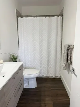 a bathroom with a sink and a toilet