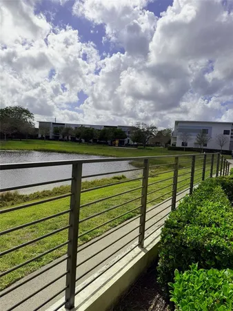 a view of a lake with outdoor seating